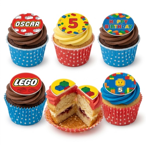 Assortment of LEGO theme cupcakes with building block designs and custom age topper.