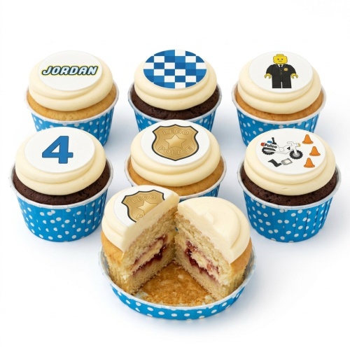 Lego Police themed cupcakes with custom age and name toppers, in blue polka dot wrappers.
