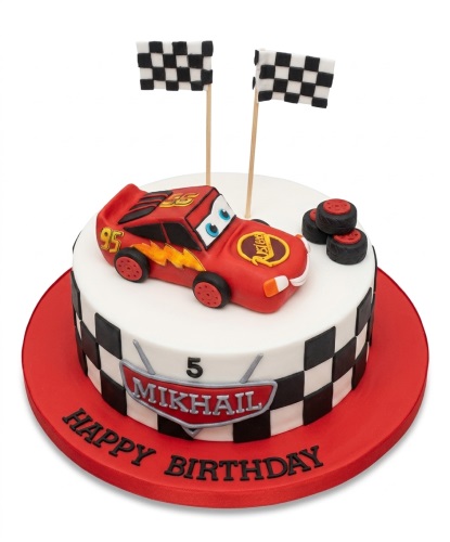Disney Lightning McQueen car birthday cake with racing flags, chequered design, and custom age and name plaque.