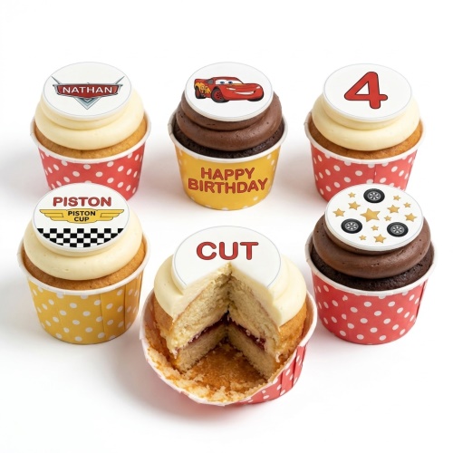 Set of Disney Cars themed cupcakes with Lightning McQueen, Piston Cup, car badge, custom age topper, and car wheel designs.