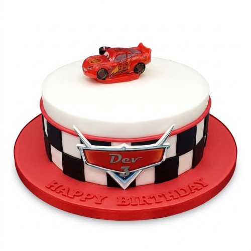 Round white cake with Lightning McQueen car topper, checkered flag design, and red base.
