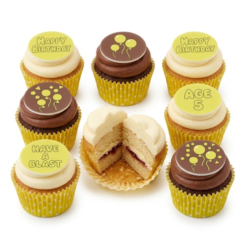 Assortment of birthday cupcakes with yellow and chocolate frosting, topped with balloons and custom age messages.