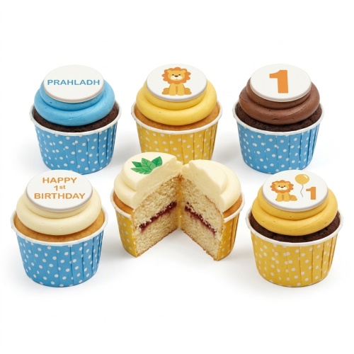 Set of jungle lion 1st birthday cupcakes with number one and custom name toppers.