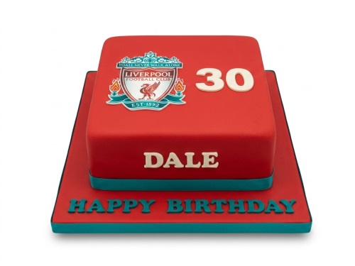 Two-tiered red Liverpool FC football birthday cake with custom age and name.