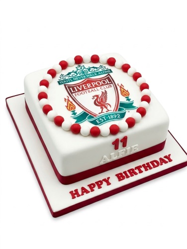 White square cake with Liverpool Football Club logo, red and white balls, and a red "Happy Birthday" message.