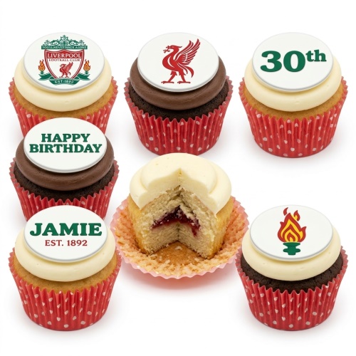 Assortment of Liverpool Football Club themed cupcakes with various toppers and red polka dot wrappers.