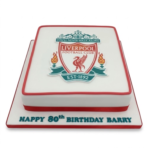 Two-tier white and red Liverpool FC football birthday cake with club crest and custom message.