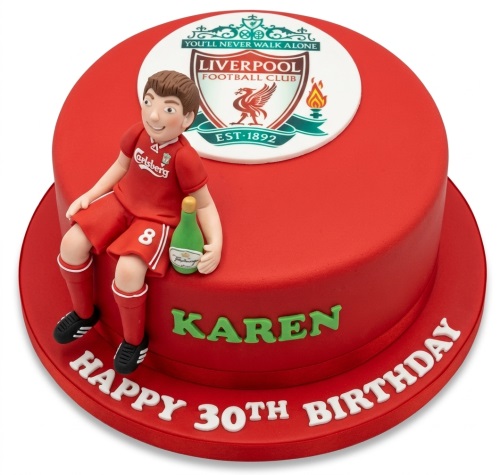 Red Liverpool Football Club themed birthday cake with edible player figure and custom message.