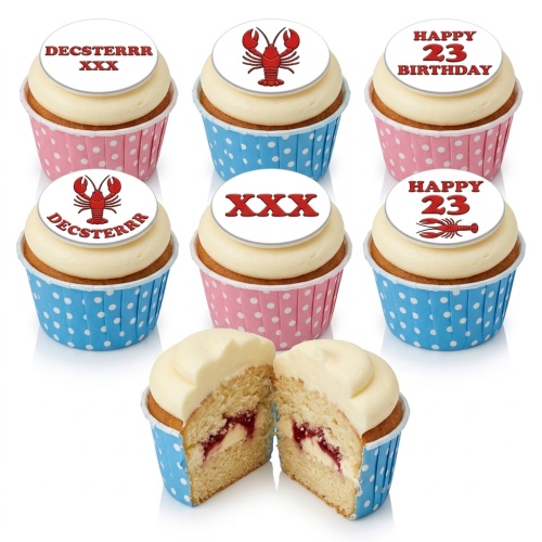 Lobster theme birthday cupcakes with edible toppers, featuring red lobsters and custom text on white frosting.