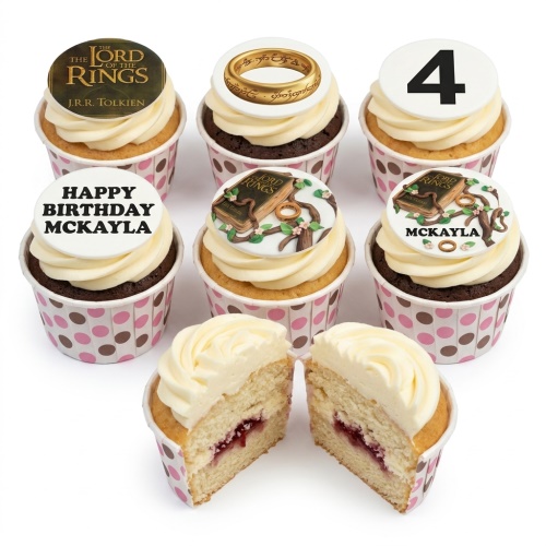 Lord of the Rings themed birthday cupcakes with logo, ring, and book toppers, some with custom age and message.
