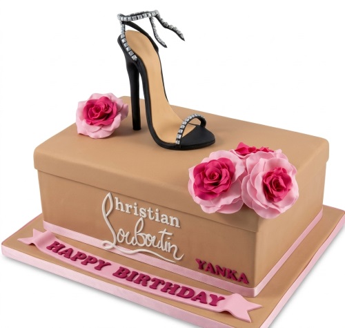 Beige shoe box cake with black high heel shoe, diamante straps, and pink sugar roses.