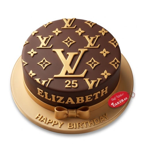 Round brown cake with gold Louis Vuitton monogram pattern, gold ribbon, and custom age/name.