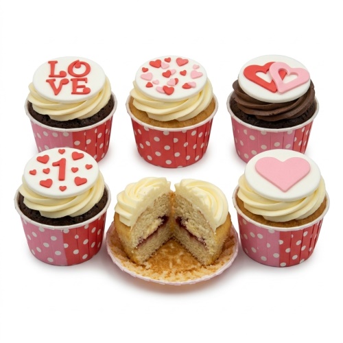 Six cupcakes with white and chocolate frosting, red and pink heart decorations, and custom message toppers, in red and pink polka dot cases.