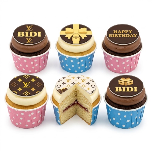 Six designer-inspired cupcakes with brown and gold luxury brand toppers, some with gift boxes and 'Happy Birthday' message.