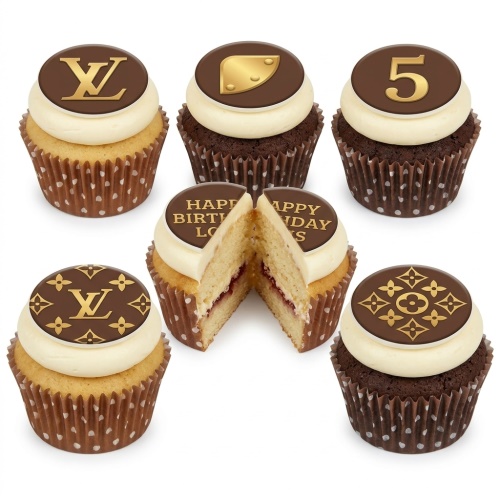 A selection of LV branded cupcakes with cream frosting, brown cases, and custom age and message toppers.