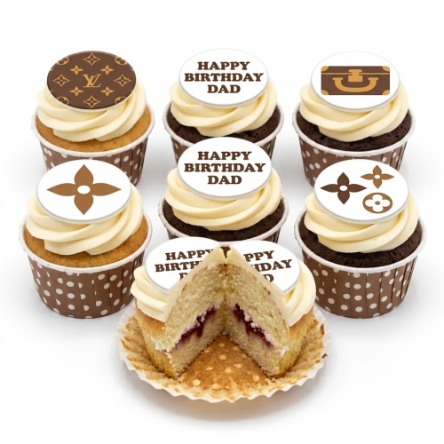 Six cupcakes with brown and white frosting, topped with LV-style monograms, a trunk, and 'Happy Birthday Dad' messages.