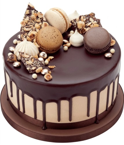 Round chocolate drip cake with macarons, hazelnuts, and meringue kisses