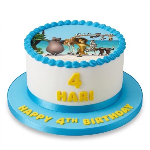 Round white cake with Madagascar characters edible image, blue border, and custom age/name.
