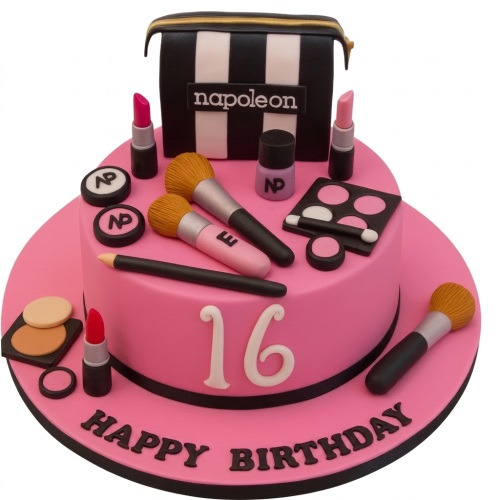Two-tiered pink birthday cake decorated with edible fondant makeup items including a striped bag, lipsticks, brushes, and an eyeshadow palette.