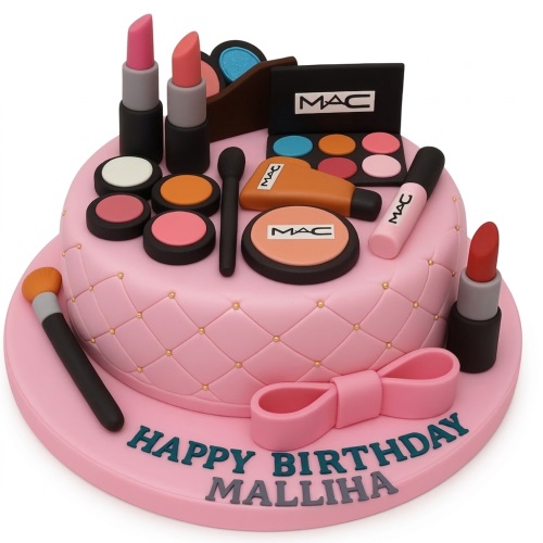 Pink single-tier cake with quilted pattern and edible MAC inspired makeup decorations, including lipsticks, eyeshadow, and brushes.