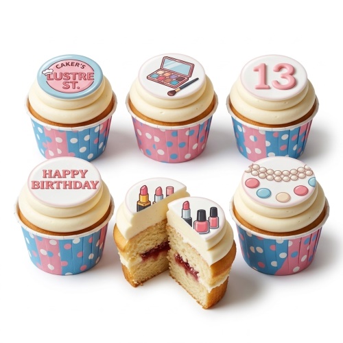 Six cupcakes with white frosting, decorated with makeup, jewellery, and 'Happy Birthday' toppers, featuring a custom age number.
