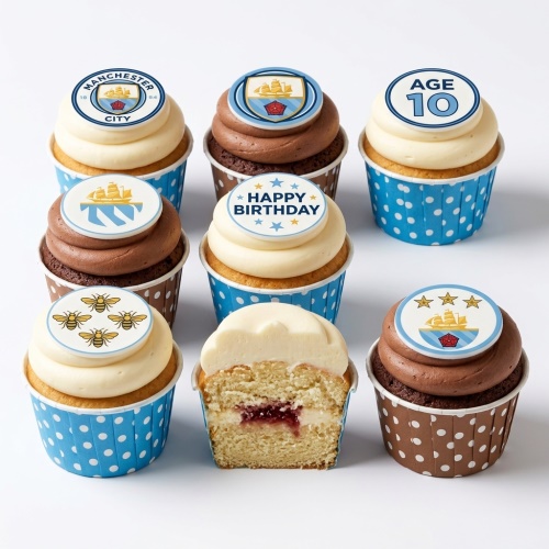 Selection of Manchester City themed birthday cupcakes with club crest, Happy Birthday, and custom age toppers.