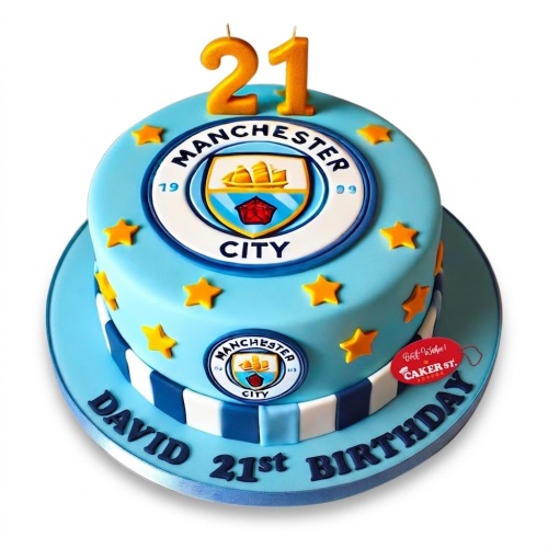 Two-tier Manchester City football birthday cake with club crest, blue and white stripes, and gold stars.