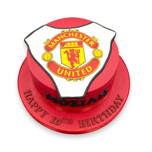 Round red Manchester United football birthday cake with custom name and age.