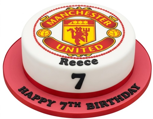 Round Manchester United football birthday cake with club crest, custom name, and age.