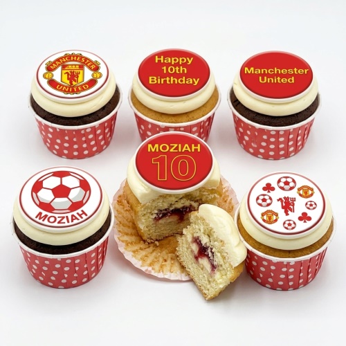 Manchester United themed cupcakes with club logo, footballs, and custom age topper.