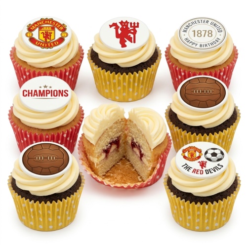 Manchester United themed cupcakes with club crests, Red Devil logo, football, and 'Happy Birthday' toppers.