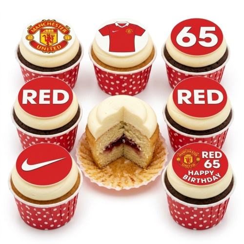 Set of Manchester United themed birthday cupcakes with club crest, red shirt, 'RED' text, and custom age '65' toppers on white frosting in red polka dot wrappers.