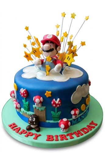 Round blue Super Mario birthday cake with Mario figure, red mushrooms, Goomba, yellow stars, and 'Happy Birthday' message.
