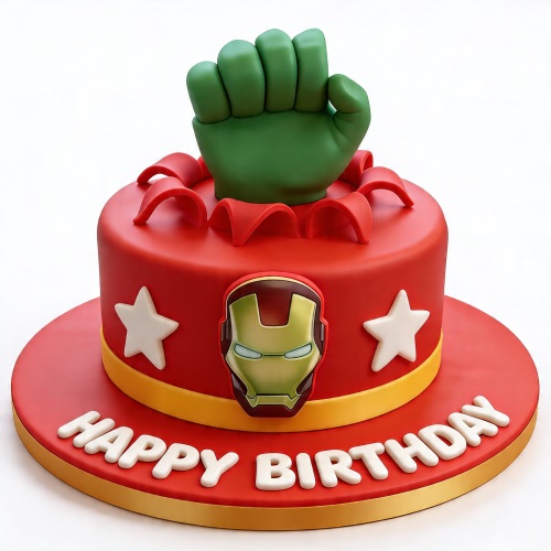 Red superhero birthday cake with green Hulk fist and Iron Man mask, decorated with white stars.