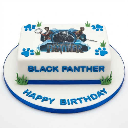 Square white Black Panther birthday cake with edible image, blue paw prints, and green grass details.