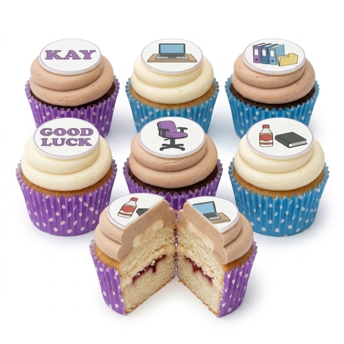 Cupcakes with office-themed toppers and 'Good Luck' message, in purple and blue wrappers.