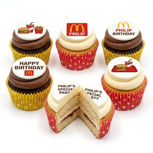 Cupcakes with McDonald's logo, burger, fries, and drink toppers for a birthday party.