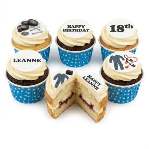 Cupcakes with mechanic tools, jumpsuit, car tires, and jump leads, with custom age and name toppers.