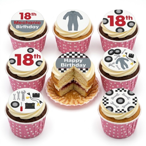 Cupcakes with mechanic tools, car wheels, jumpsuit, and checkered flag toppers for a custom age birthday.