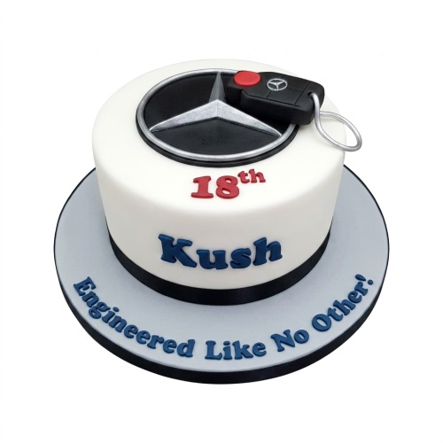 White round cake with Mercedes-Benz logo and car key topper, with custom age and name text.