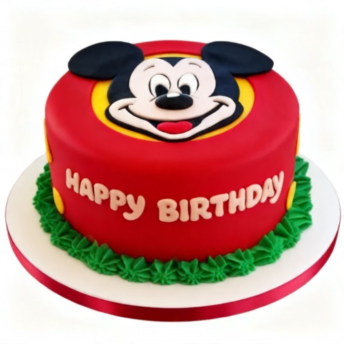 Round red Mickey Mouse birthday cake with a 3D face and green piped border.