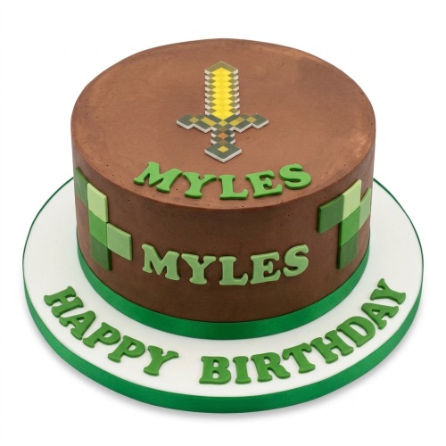 Round brown Minecraft theme birthday cake with pixel sword topper and green block decorations.