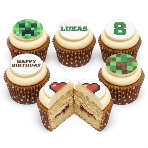 Minecraft themed cupcakes with Creeper, grass block, and pixelated heart toppers on vanilla icing.