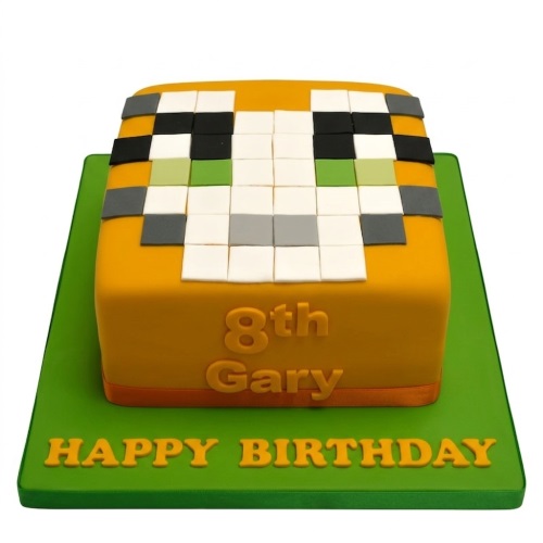 Square orange cake with a pixelated character face on top, green cake board, custom age and name visible.