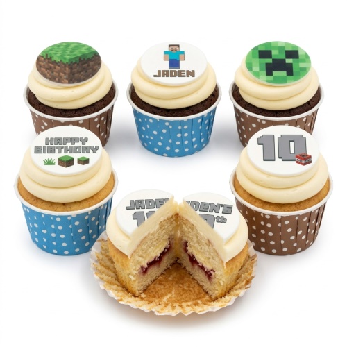 Minecraft themed birthday cupcakes with grass block, Creeper, Steve, and custom age and message toppers.