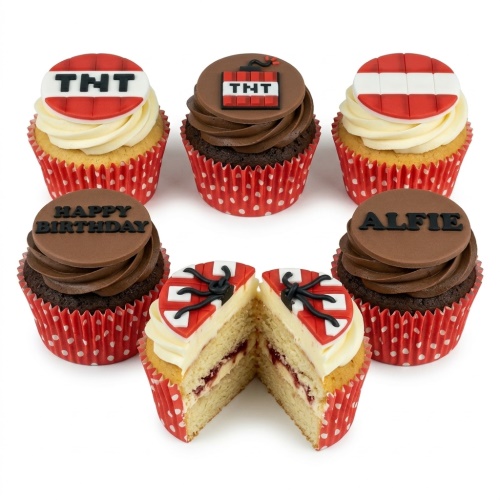 Selection of Minecraft TNT themed birthday cupcakes with red and white designs, some with 'Happy Birthday' and 'Alfie' toppers, in red polka dot cases.