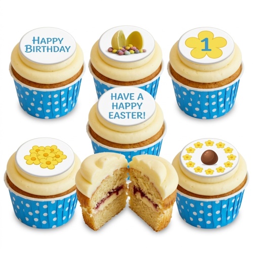 A set of vanilla cupcakes with cream frosting in blue polka dot cases, featuring personalised toppers including 'Happy Birthday', yellow flowers, a number '1', and Easter chocolate eggs.