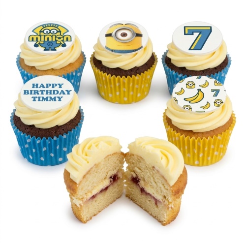 Minions themed cupcakes with yellow and blue cases, featuring Minion characters, logo, bananas, a custom age topper, and a personalised birthday message.