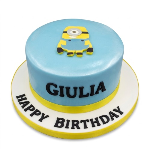 Round light blue Minion birthday cake with a yellow ribbon and space for a personalised name.