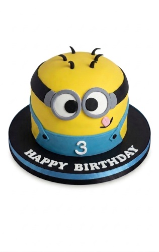 Round yellow Minion birthday cake with goggles, blue overalls, and 'Happy Birthday' message.